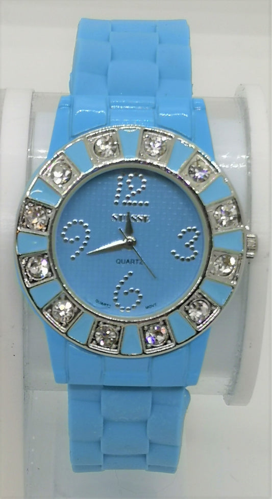 Blue fashion bangle style watch with silicone strap and cubic zirconia's around the face