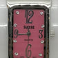 Pink bangle style fashion watch with large numbers