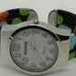 Fashion Bangle style watch with black strap with blue, orange and green polka dots